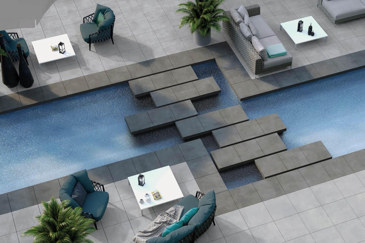 Terrassenplatten Grau Betonoptik auf einer Terrasse mit Pool